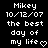 Pixelated text on black background reads 'Mikey', '10/12/07', 'the best day of my life', with a heart symbol replacing the 'o' in 'life'.