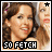 Pixelated image of two women with brown hair, one smiling broadly in foreground and another partially visible behind her, both wearing light-colored tops with text "SO FETCH" at bottom.