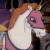 A 50x50 pixel animated buddy icon featuring a cartoon horse on the left and green text reading "Original Icons .com" on the right against a dark background.