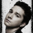 Pixelated grayscale image of a person's face in profile view with closed eyes and dark hair against light background.