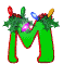 Green letter M with red outline, decorated with holly and colored lights; animation shows light bulbs changing color across frames.