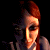 A pixelated contact sheet showing two frames of an animated icon featuring a character with red hair and green text reading "Original Icons .com" on a dark background.
