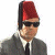 A pixelated contact sheet showing two frames of an animated icon featuring a character in a red fez hat and sunglasses on the left, with green text reading "Original Icons .com" on a dark green background to the right.