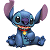 Static pixelated image of a blue cartoon alien character with large ears, black eyes, and a colorful striped collar sitting upright against white background.