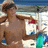 A pixelated image shows a shirtless man on a beach with a blue background containing yellow text reading "My Future Husband."