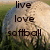 Pixelated image with text 'live love softball' overlaid on a blurred background of green and beige tones.
