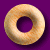 A purple background displays a donut icon and light blue text spelling 'DONUT!' with an exclamation mark.