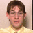 Pixelated image of a person in yellow shirt with text 'Bears.', 'Beets.', and 'Battle Star Galactica.' on cyan background.