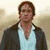 A person in a dark jacket and light blue shirt appears in a static image with overlaid text reading "You have Bewitched me Body & Soul" in bright pink and black lettering.