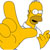 Yellow cartoon character with large thumbs-up gesture, open mouth showing teeth, and one visible eye on a white background.