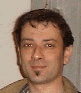 Three distinct head-and-shoulders portraits of adult males arranged in a , each with unique facial features and clothing