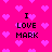 Pixelated pink background with scattered light purple hearts and black text reading "I LOVE MARK" in four positions.