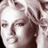 Static 48x48 pixel icon showing a close-up of a person's face with dark hair and neutral expression, rendered in low-resolution grayscale tones on white background.