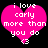 Two identical pink heart-shaped icons with white pixelated text reading "i love carly more than you do" and a small heart symbol at the bottom, set against black background.