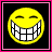 A split-frame contact sheet showing two distinct animated frames: a yellow smiley face with exaggerated teeth on the left and pixelated text reading "Say Cheesell" on the right, both within pink borders against black backgrounds.