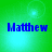 Four identical display blue pixelated text 'Matthew' on a green background with light blue circular highlights