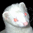 Pixelated white animal head with pink cheeks and red eyes against black background, static image.