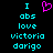 Pixelated cyan text on black background with a pink heart symbol above the text, displayed in two identical side-by-side