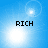 Four identical blue each display the word RICH in black pixelated text over a bright white light burst with lens flare effects