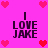 Pixelated pink background with four identical text blocks reading "I LOVE JAKE" surrounded by red and pink heart icons.