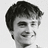 Black-and-white pixelated image of a person with short dark hair on left, text on right reads 'love at first sight esther + radcliffe' in pixel font.