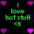 Pixelated green text 'love hot stuff <3' surrounded by purple and pink heart icons on a black background, with alternating heart colors in the center.