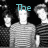 A static image shows five pixelated figures in grayscale with teal text reading "The Vigilantes" above them against a black background.