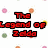 Pixelated text 'The Legend of Zelda' in red with black outline over white background with scattered colored dots.