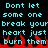 Pixelated cyan text on black background with red flame-like shapes at bottom, repeating 'Dont let some one break your heart just burn them' across three