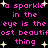 Pixelated pink text on black background with white starbursts, repeating 'a sparkle in the eye is the most beautiful thing' across multiple lines.