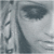A 50x50 pixel animated buddy icon featuring a grayscale close-up of a person's eye and partial face on the left, paired with bold black text "Xtina" on the right against a white background.