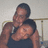 A pixelated image of two people embracing on a red background with text labels.