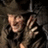 Pixelated image of a person in dark clothing and hat with hand near face, alongside text elements on colored backgrounds.