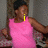 A person in a pink sleeveless top and dark cap appears across three with yellow text overlays reading 'i', 'got', and 'muscles.'