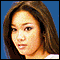 Five distinct head-and-shoulders portraits of women with varied hair colors and styles against solid blue backgrounds, one empty gray