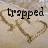 Two heart shapes drawn in sand with text above reading 'trapped in' and 'sailor love'