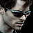 Pixelated image of a person wearing sunglasses with text 'THE LAST STAND' and date '5.26.06' displayed.