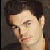A pixelated image divided into four quadrants showing a person's face, green text reading OWNS, and large blocky letters spelling BIG BRO 2.
