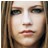 Static 48x48 pixel icon showing a close-up of a person's face with light brown hair, visible eyes, nose, mouth, and skin tones rendered in low-resolution pixels.