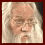 A small square image shows a person with long white hair and beard on the left, against a dark red background with gold text reading "Nitwit! Blubber! Oddment! Tweak!".