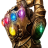 A brown armored gauntlet with six colored gemstones embedded in its knuckles, set against a plain gray background.