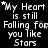 Black background with white pixelated text reading "My Heart is still Falling for you Like Stars" arranged in a , some letters and stars animated to change position