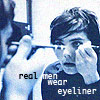 A static image shows a person holding a makeup brush near their face with text overlay reading 'real men wear eyeliner' in pixelated font.
