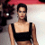 A 50x50 pixel animated contact sheet showing two frames of a woman in a black crop top against a blurred background with green text reading "Original Icons .com" on the right side.