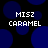 Pixelated blue circles on black background with repeated white text 'MISZ CARAMEL' in four quadrants.