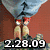 A pixelated image shows a figure in blue pants and red shoes holding a balloon, with '2.28.09' text below on a reddish background.