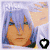 Pixelated anime-style character with light blue hair and green eyes, static image with heart and text overlay.