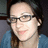 A pixelated image shows a person with dark hair and glasses on the left, next to pink background with red text reading 'YAY IT'S ME! WOO HOO!' in blocky letters.