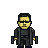 Pixel art of a figure in dark clothing with yellow hands, black hair, and dark glasses against a gray background.