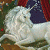 A 50x50 pixel animated buddy icon featuring a white unicorn with a blue mane and red background on the left, transitioning to green text reading "Original Icons .com" on a dark green background on the right.
